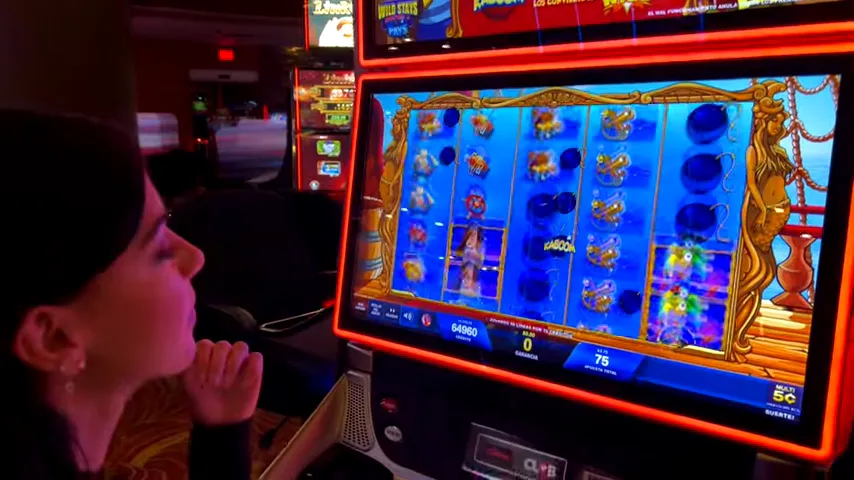 Jugador celebrando un premio de jackpot en el casino